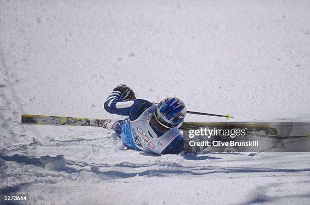 Alberto Tomba of Italy falls during the mens giant slalom at Shiga Kogen during the 1998 Olympic Winter Games in Nagano, Japan. \ Mandatory Credit:...
