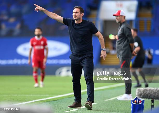 Frank Lampard, Manager of Chelsea gives his team instructions during the Premier League match between Chelsea and Liverpool at Stamford Bridge on...