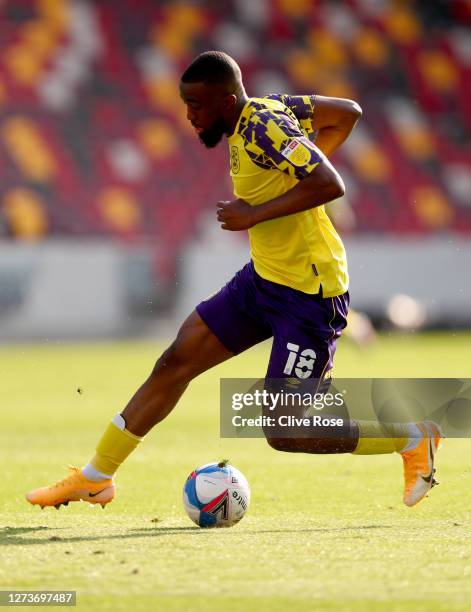 Isaac Mbenza of Huddersfield in action during the Sky Bet Championship match between Brentford and Huddersfield Town at Brentford Community Stadium...