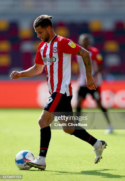 Emiliano Marcondes of Brentford in action during the Sky Bet Championship match between Brentford and Huddersfield Town at Brentford Community...