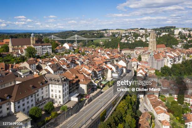 aerial view of the alps road leading to the fribourg old town in switzerland - freiburg skyline stock pictures, royalty-free photos & images