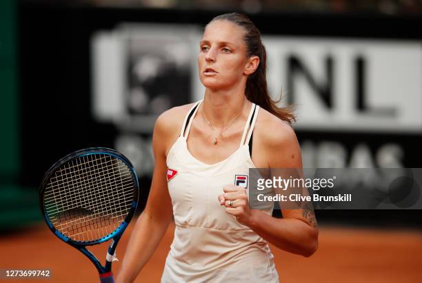 Karolina Pliskova of The Czech Republic celebrates after winning the first set in her semi-final match against Marketa Vondrousova of The Czech...