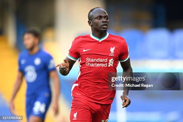 Sadio Mane of Liverpool celebrates after scoring his team's first goal during the Premier League match between Chelsea and Liverpool at Stamford...