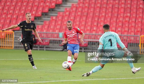 Roberto Soldado of Granada CF scores his team's first goal during the La Liga Santander match between Granada CF and Deportivo Alaves at Estadio...