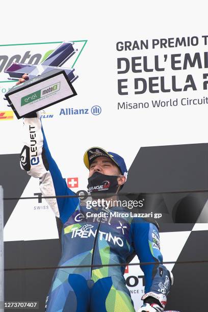 Matteo Ferrari of Italy and Trentino Gresini MotoE celebrates the victory on the podium during the MotoE race during the MotoGP Of San Marino - Race...