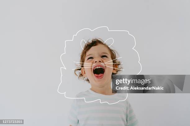 little lion boy - imagination doodles stock pictures, royalty-free photos & images