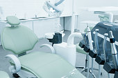 Dental chair and equipment. Patient reception room in a modern medical center.