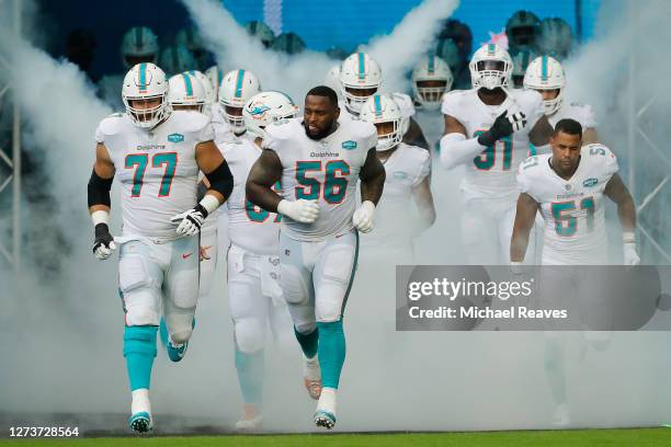 The Miami Dolphins take the field prior to the game against the Buffalo Bills at Hard Rock Stadium on September 20, 2020 in Miami Gardens, Florida.