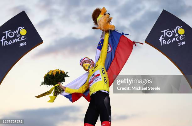 Podium / Tadej Pogacar of Slovenia and UAE Team Emirates Yellow Leader Jersey / Celebration / Mascot / Flowers / Mask / Covid safety measures /...