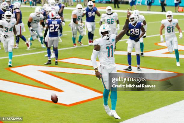 DeVante Parker of the Miami Dolphins celebrates after a touchdown reception against the Buffalo Bills during the first half at Hard Rock Stadium on...