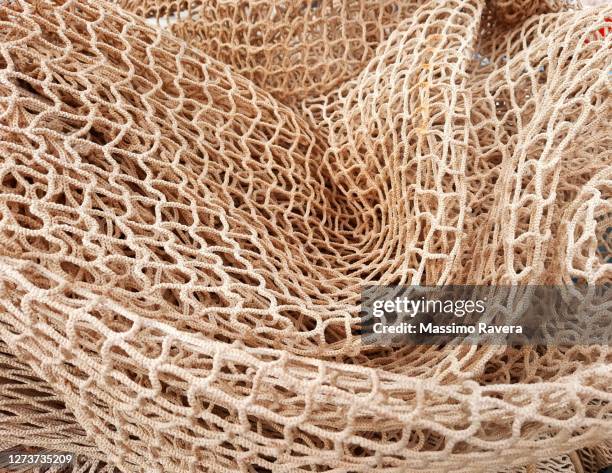 fishing net - commercial fishing net stock-fotos und bilder