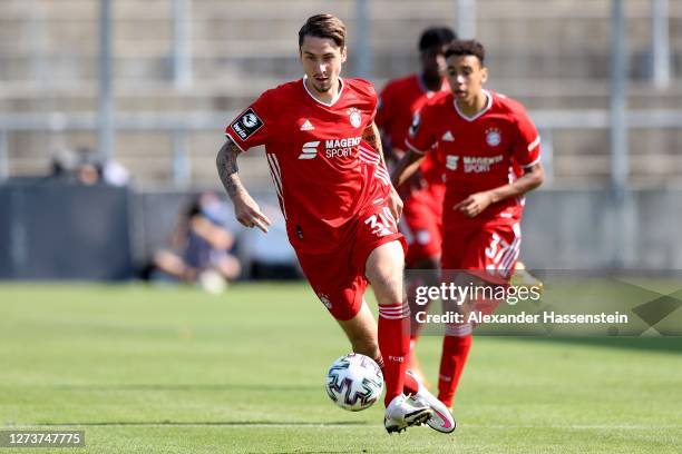 Adrian Fein of Bayern II runs with the ball during the 3. Liga match between Bayern Muenchen II and Tuerkguecue Muenchen at Stadion an der...