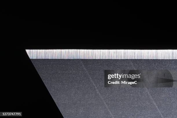 extreme close-up view of sharp blade - utility knife stockfoto's en -beelden