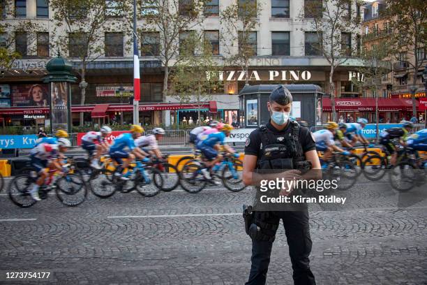 Slovian cycle fans arrive on the Champs Elysees to watch the final stage of the Tour de France and see their compatriot Tadej Pogacar win this year's...