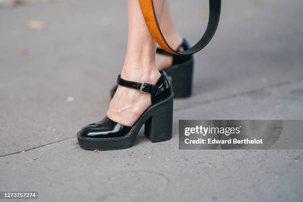 Natalia Verza wears black shoes from Prada, on September 10, 2020 in Paris, France.