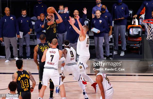 Anthony Davis of the Los Angeles Lakers shoots a three point basket to win the game over Denver Nuggets in Game Two of the Western Conference Finals...