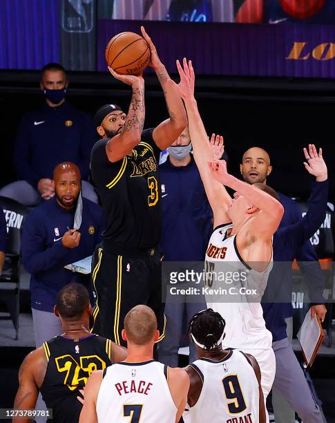 Anthony Davis of the Los Angeles Lakers shoots a three point basket to win the game over Denver Nuggets in Game Two of the Western Conference Finals...
