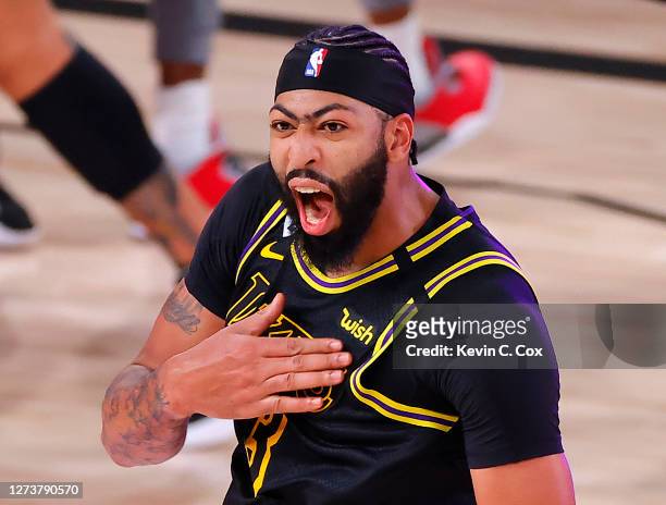 Anthony Davis of the Los Angeles Lakers celebrates after shooting a three point basket to win the game over Denver Nuggets in Game Two of the Western...