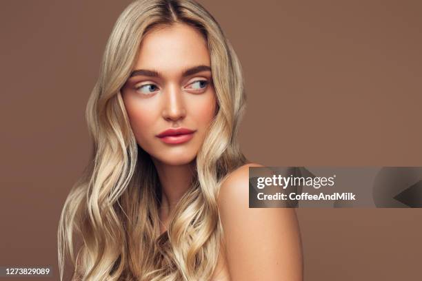 beautiful and excited blond woman - female model stock pictures, royalty-free photos & images