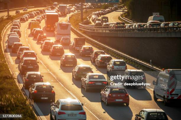 traffic-jam on highway a1 near hamburg- city at rush-hour at the weekend - cue stock pictures, royalty-free photos & images