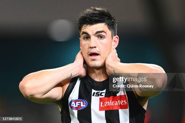 Brayden Maynard of the Magpies comes from the ground after a head clash with Isaac Quaynor of the Magpies during the round 18 AFL match between the...