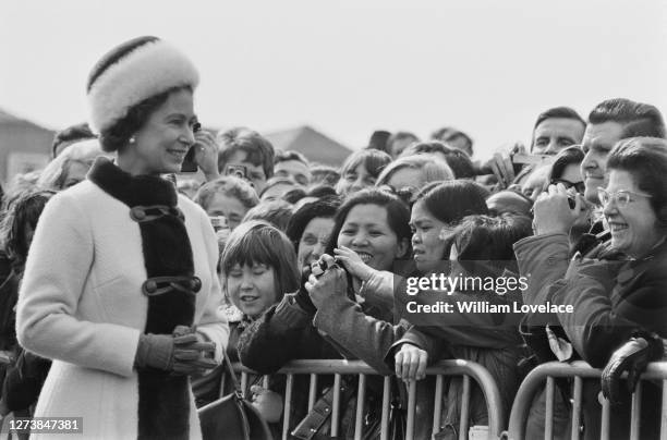 British Royal Queen Elizabeth II greeted by crowds of well-wishers as she opens London Bridge over the River Thames in London, England, 17th March...