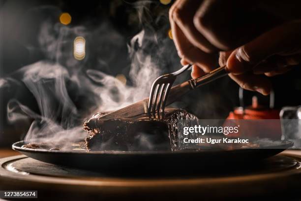 cutting brownie - brownie stock pictures, royalty-free photos & images