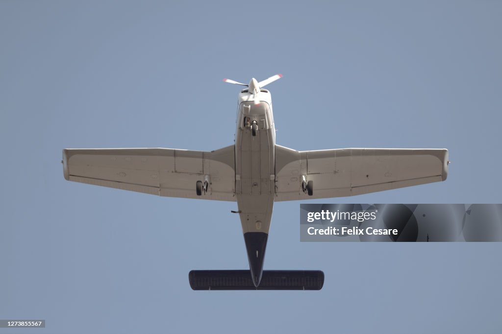 Microlight plane flying over