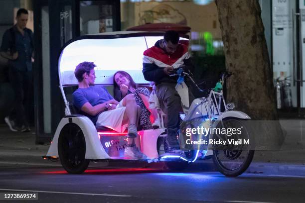 Exclusive Photos** Matt Smith seen at Groucho Club with Sophie Russell before leaving in a rickshaw on September 15, 2020 in London, England.