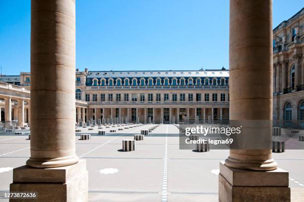 buren columns in palais royal, without people, during covid19 lockdown in paris - palais royal stock pictures, royalty-free photos & images