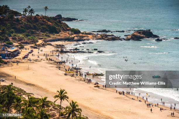 view of vagator beach from chapora fort, goa, india - chapora fort stock pictures, royalty-free photos & images