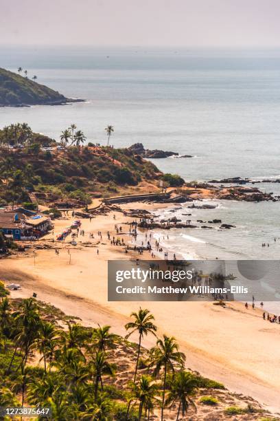 view of vagator beach from chapora fort, goa, india - chapora fort stock pictures, royalty-free photos & images