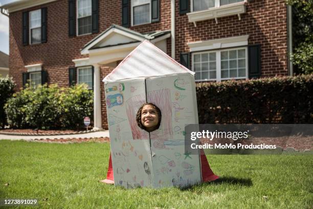 young girl playing with homemade rocket ship - rocket scientist stock pictures, royalty-free photos & images