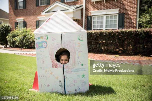 young girl playing with homemade rocket ship - rocket scientist stock pictures, royalty-free photos & images