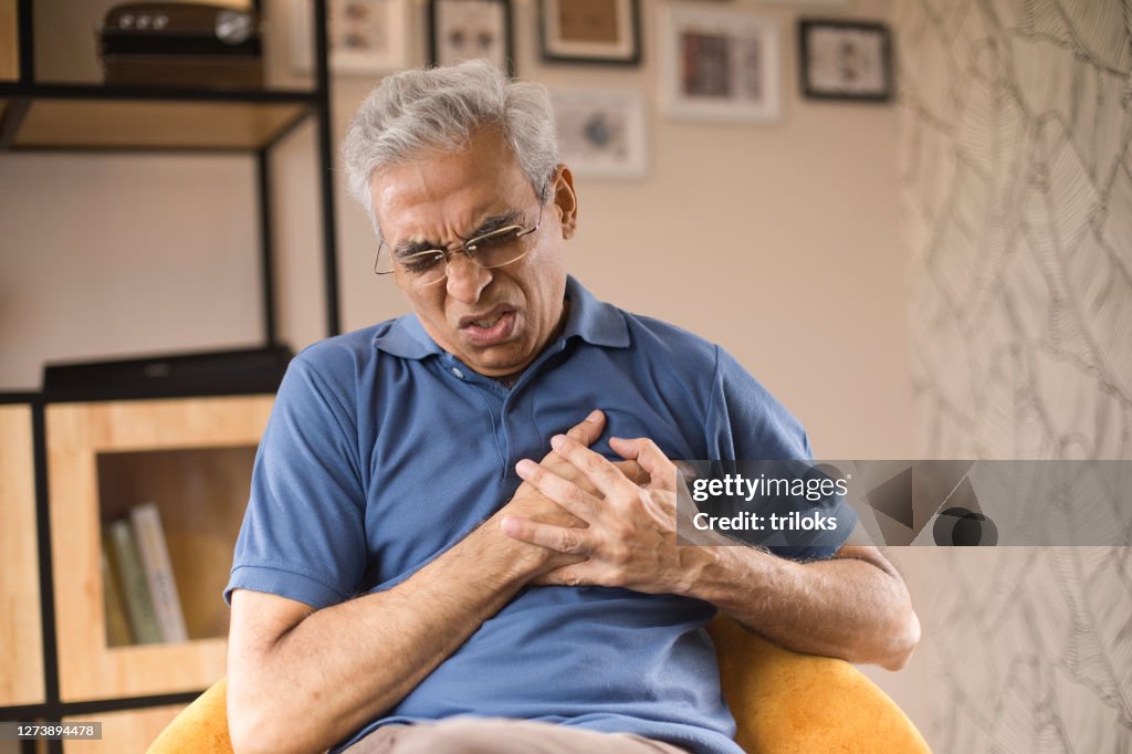 Old Man Suffering With Heart Disease High-Res Stock Photo - Getty Images