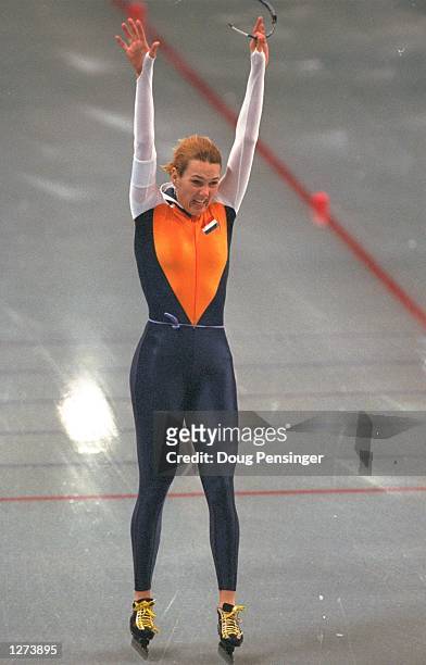 Marianne Timmer of the Netherlands takes first place in the 1000m speed skate at the M-Wave Arena during the 1998 Olympic Winter Games in Nagano,...