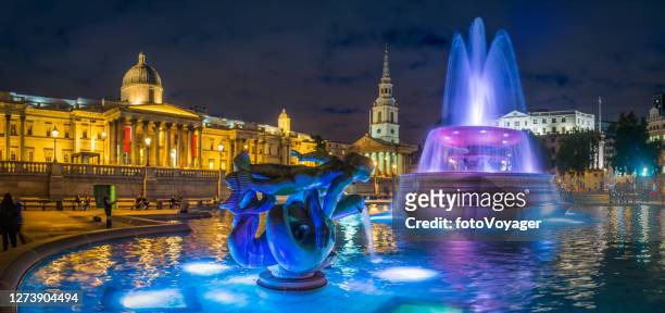 london trafalgar square fountains illuminated at night panorama uk - national portrait gallery london stock pictures, royalty-free photos & images