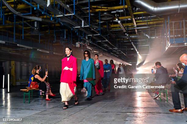 Models walk the runway during the finale at the Pronounce show during LFW September 2020 at Printworks on September 21, 2020 in London, England.