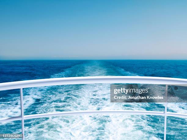 view of ocean from cruise ship railing - ship back view stock pictures, royalty-free photos & images