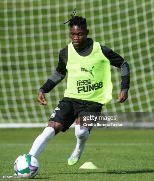 Christian Atsu passes the ball during a Newcastle United training session at the Newcastle United Training Centre on September 21, 2020 in Newcastle...