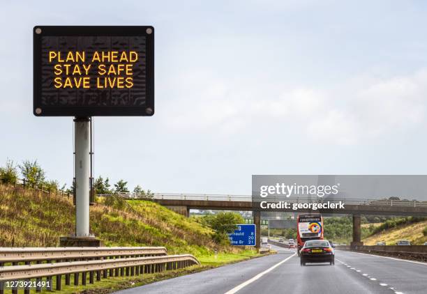 plan ahead, stay safe, save lives road sign - road safety stock pictures, royalty-free photos & images