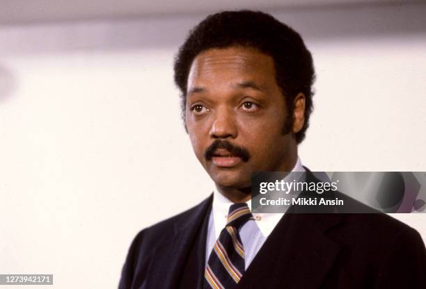 Jesse Jackson meets with Presidential candidate Michael Dukakis just before Jackson speaks at the Congressional Black Caucus in October 1988 in...