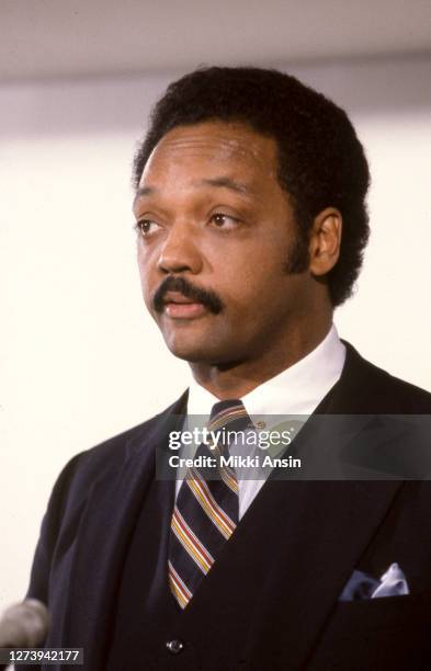 Jesse Jackson meets with Presidential candidate Michael Dukakis just before Jackson speaks at the Congressional Black Caucus in October 1988 in...