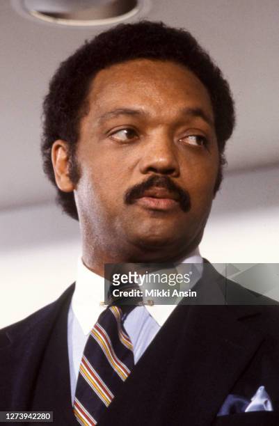 Jesse Jackson meets with Presidential candidate Michael Dukakis just before Jackson speaks at the Congressional Black Caucus in October 1988 in...