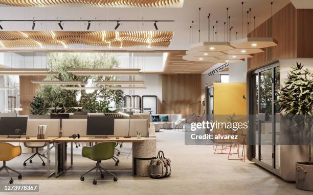 imagen 3d de un espacio de oficina de coworking respetuoso con el medio ambiente - oficina fotografías e imágenes de stock