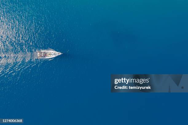 sailboat - blue sailboat stock pictures, royalty-free photos & images