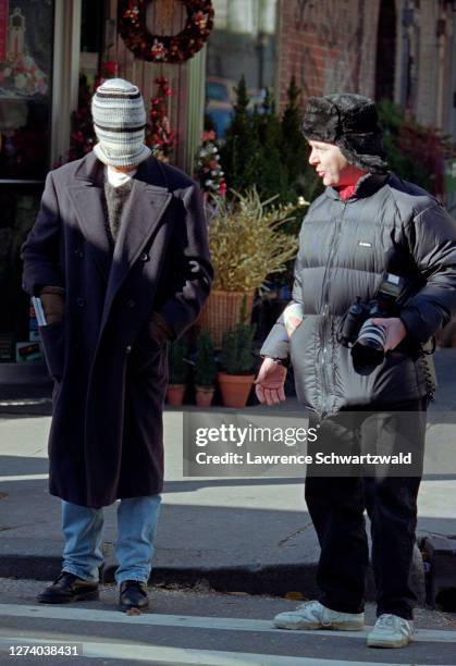 Brad Pitt spotted in a Magazine Shop on Lexington ave. By photographers. Brad covers his face and is engaged by famous photographer Mark Saunders, in...