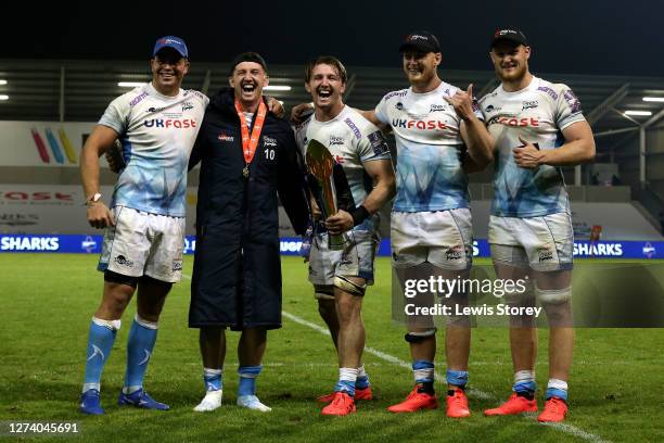 The players of Sale Sharks hold the trophy following victory in the Premiership Rugby Cup Final between Sale Shark and Harlequins at AJ Bell Stadium...