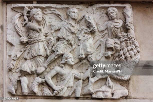 bas-relief representing a scene of war in villa borghese gardens in rome - roman sculpture stock pictures, royalty-free photos & images