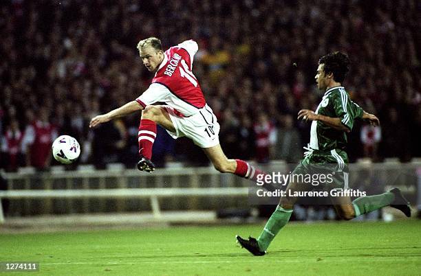 Dennis Bergkamp of Arsenal lets fly during the UEFA Champions League match against Panathinaikos at Wembley in London. Arsenal won 2-1. \ Mandatory...